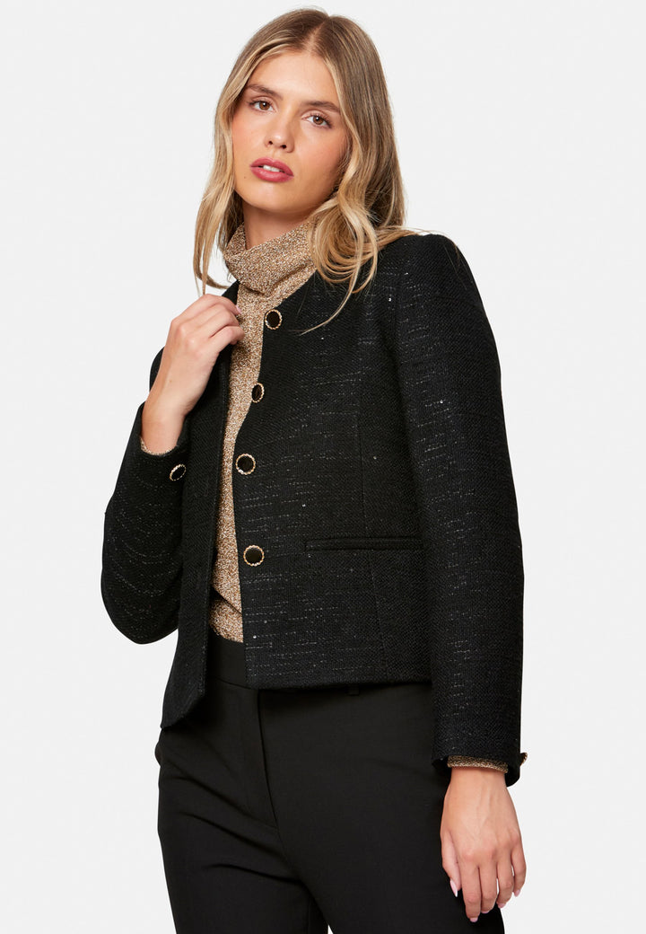 woman wearing black tweed jacket