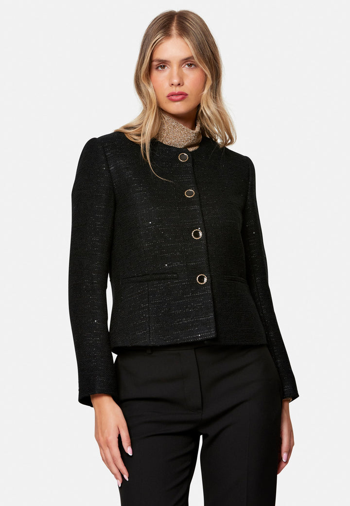 woman wearing black tweed jacket