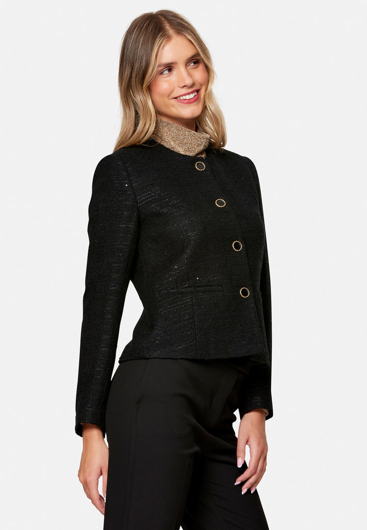 woman wearing black tweed jacket