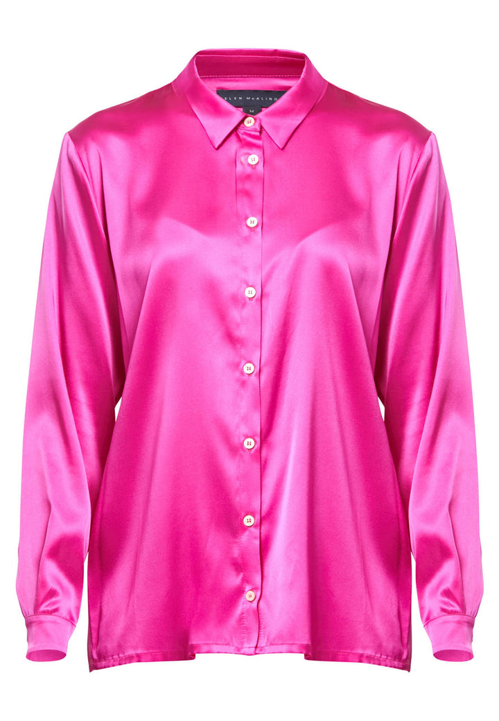 Women wearing a pink fuchsia silk satin shirt