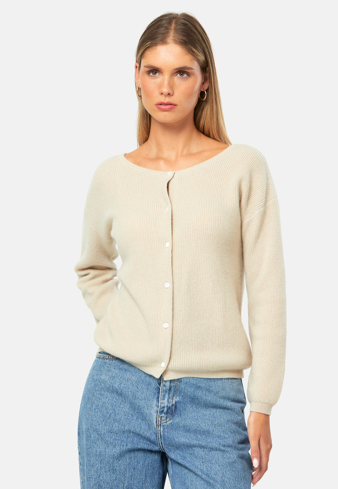 A versatile, reversible cardigan you can wear buttoned at the front or back, or pair with the matching Marlena top. Spun from pure cashmere with a plush, cloud-soft handle, it features a neat crew neckline, dropped shoulders and an easy, hip-skimming fit finished with fine rib trims.