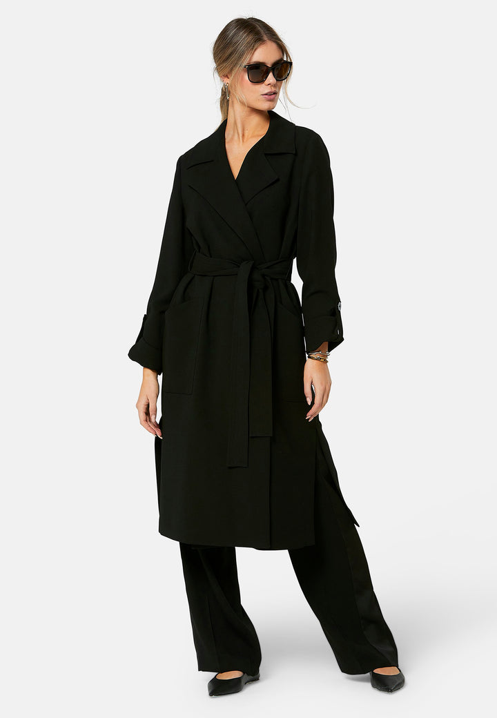 woman wearing black trench coat