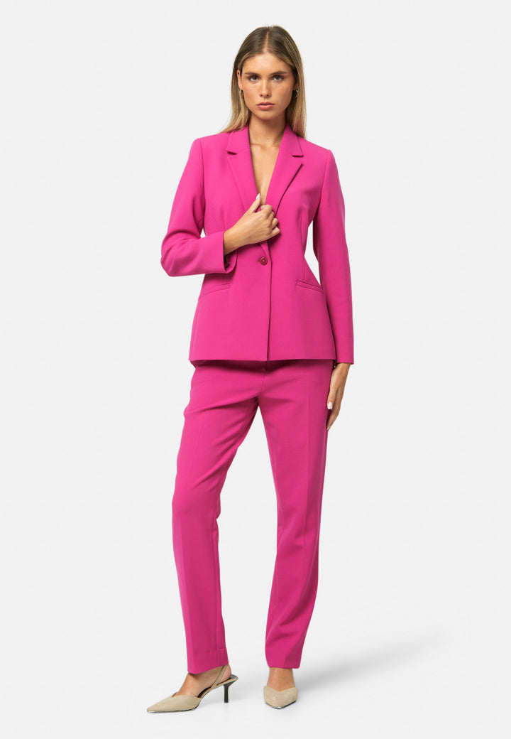 woman wearing pink suit