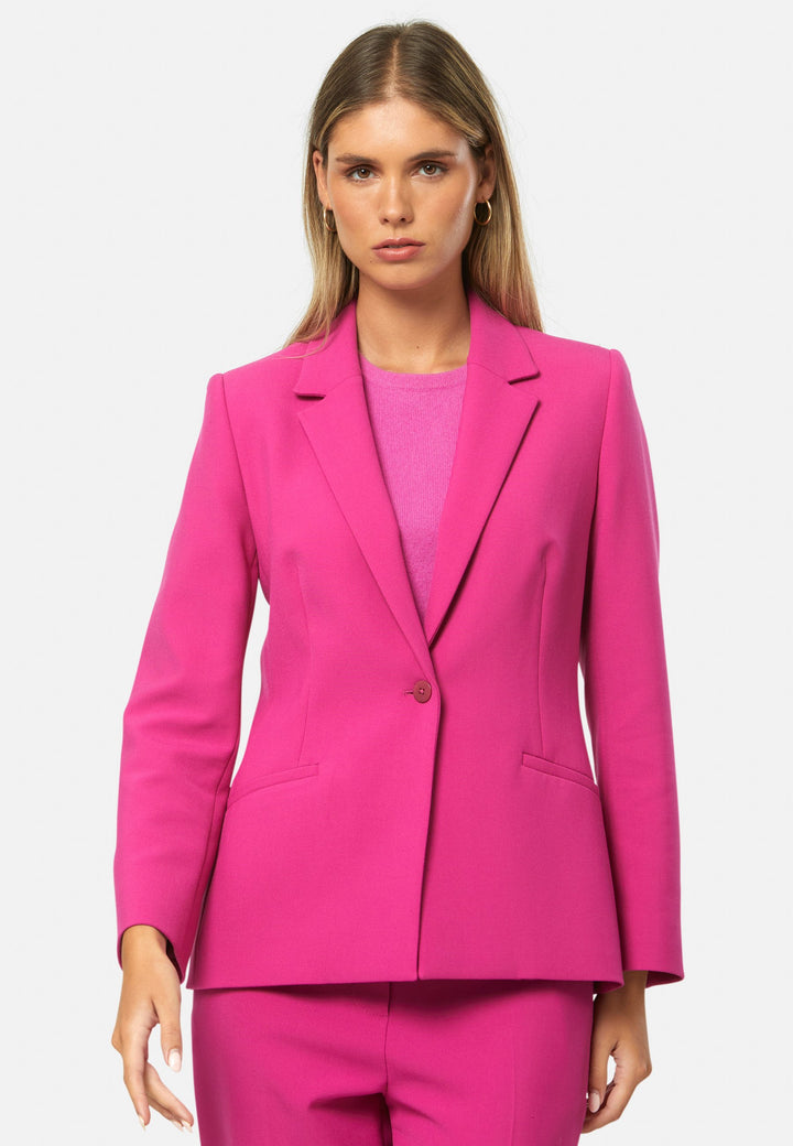 woman wearing pink suit