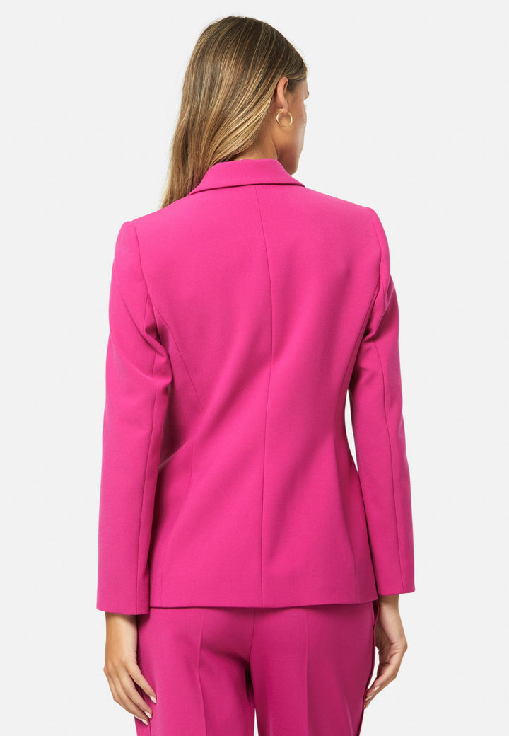 woman wearing pink suit