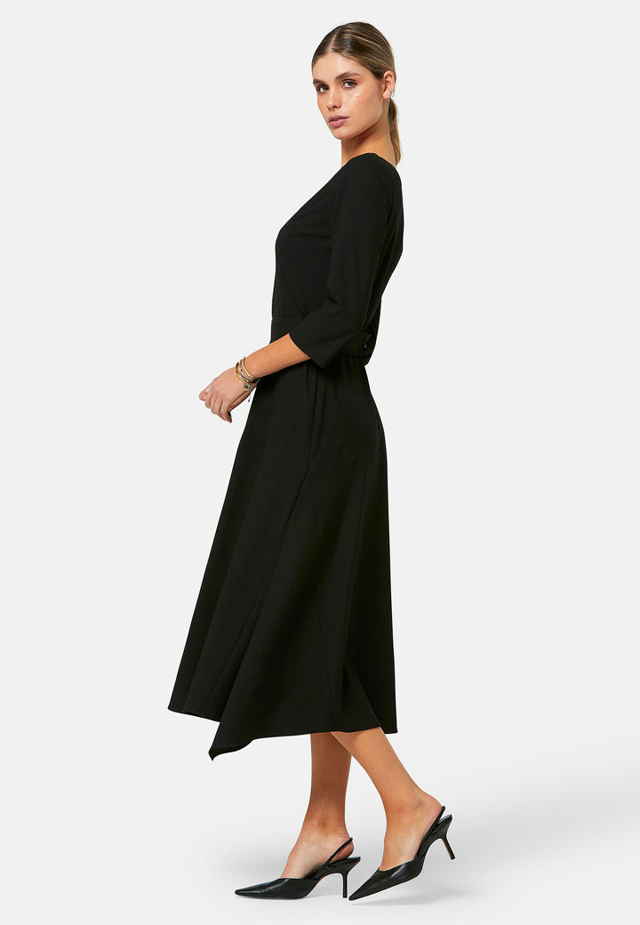 Odell, the perfect little black dress, designed in a fit and flare silhouette. Structured to the low waist, it features three-quarter sleeves, an asymmetrical hemline, and a detachable button-back belt. The flattering wide V-neckline makes it an elegant piece for any occasion.