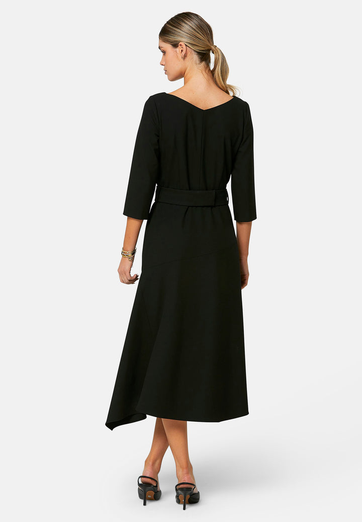 Odell, the perfect little black dress, designed in a fit and flare silhouette. Structured to the low waist, it features three-quarter sleeves, an asymmetrical hemline, and a detachable button-back belt. The flattering wide V-neckline makes it an elegant piece for any occasion.
