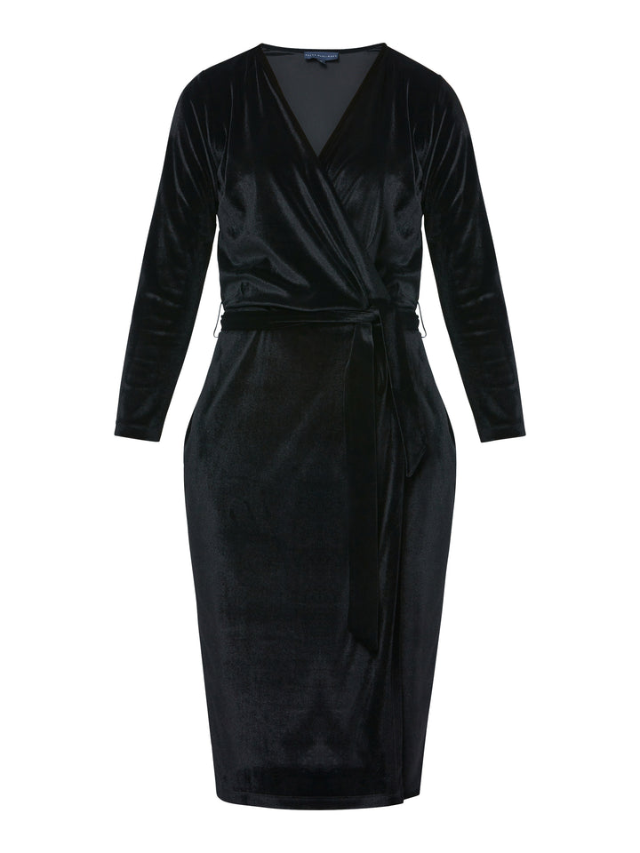 Introducing the Jordan Black Velvet Dress, a must-have addition to your winter wardrobe. This versatile dress combines luxurious stretch velvet a flattering v-neckline, offering a perfect blend of warmth, sophistication, and style. The faux wrap design creates a feminine silhouette that transitions seamlessly from desk to dinner, while the detachable belt allows you to customize your look to suit any occasion. Made with sumptuous velvet fabric.