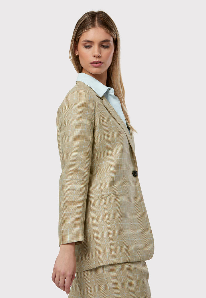 Cassie Glencheck Jacket, A refined investment crafted from tweed, showcasing a delightful blend of cream, beige, white, and baby blue hues. This jacket seamlessly combines summer elegance with versatility. With minimalist styling, a single-button fastening, and an oversized, subtly boxy silhouette, it exudes effortless sophistication. Pair it with a simple tee and the coordinating Lyra pants, finished with trainers for a chic and modern ensemble.