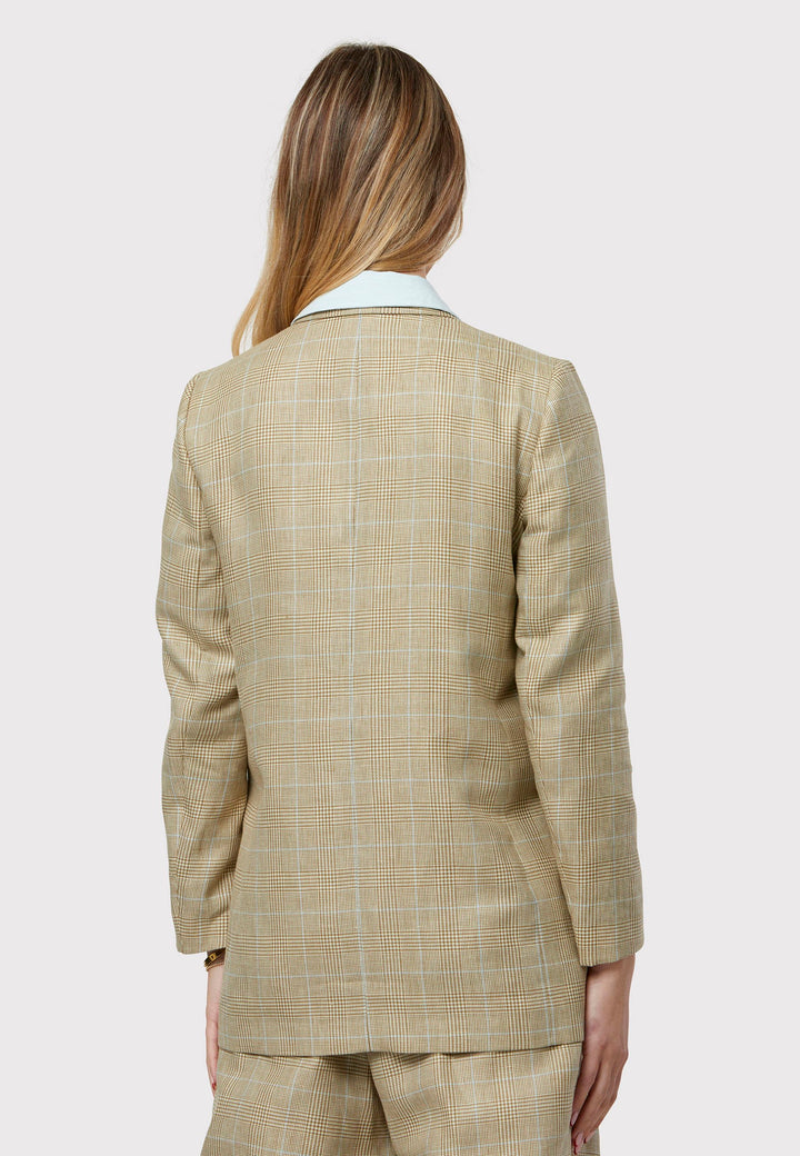 Cassie Glencheck Jacket, A refined investment crafted from tweed, showcasing a delightful blend of cream, beige, white, and baby blue hues. This jacket seamlessly combines summer elegance with versatility. With minimalist styling, a single-button fastening, and an oversized, subtly boxy silhouette, it exudes effortless sophistication. Pair it with a simple tee and the coordinating Lyra pants, finished with trainers for a chic and modern ensemble.