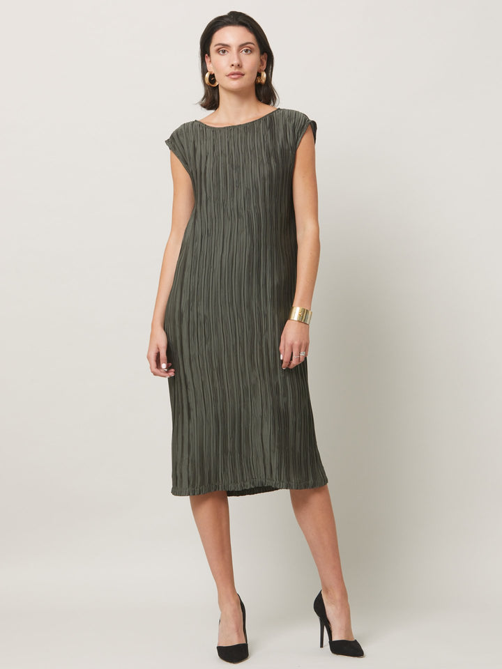 Dress for the occasion in the gemma dress. cut in an olive polished pleated fabric with contrasting satin band across the mid-riff, the ideal combination to accentuate the profile. An easy-fitting silhouette that falls to the mid-calf, features pockets and an elegant key-hole back neck detail. simply pair with heels for effortless elegance.