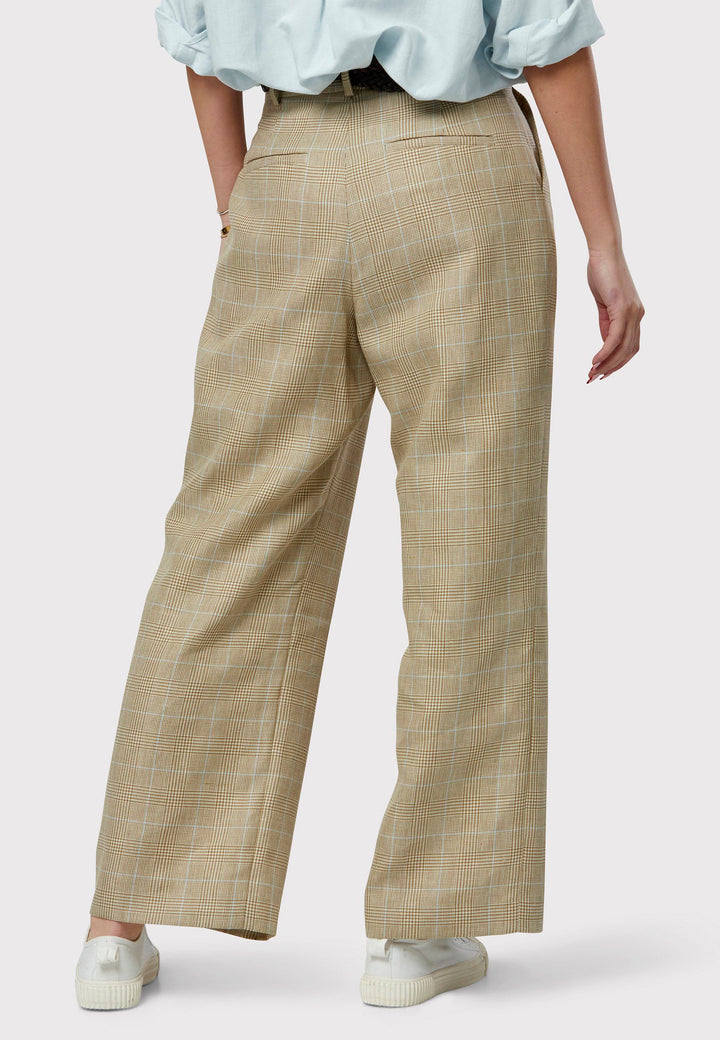Introducing the Lyra Glencheck Pants: Embrace summer sophistication with these trousers featuring a cream, beige, white, and baby blue tweed pattern. The Lyra Glencheck Pants present a relaxed yet refined silhouette, offering wide-leg styling with pleat front details for added flair. Crafted from a premium tweed blend, they strike the perfect balance between comfort and style.
