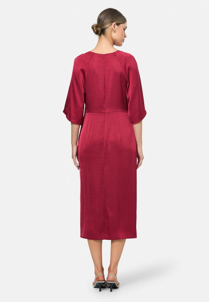 model wearing Aibhe Ruby Red Satin Dress