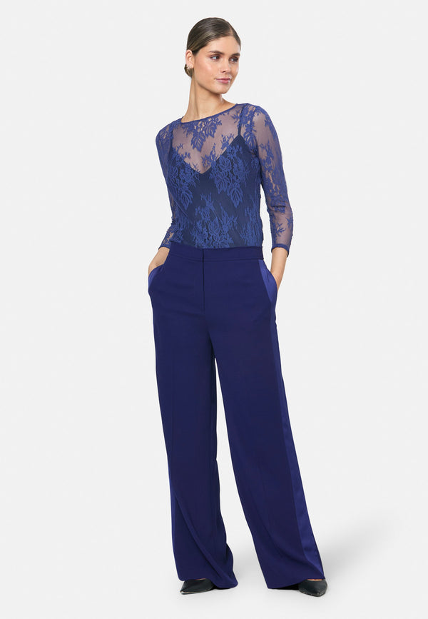 model wearing Aline Ink Blue Tux Trouser