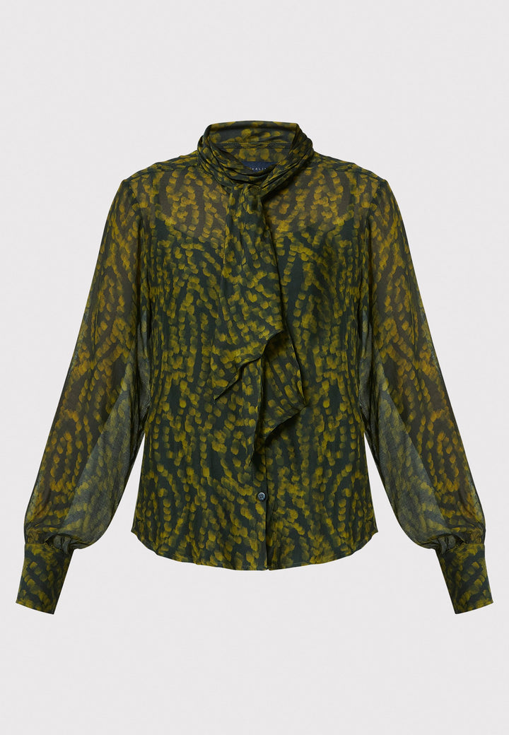 Anastasia Dark Green Forest Print Blouse, crafted from a luxurious viscose and silk blend, is perfect for your workwear wardrobe. This blouse features a round neckline, a chic pussy bow tie, and comes with a detachable slip. Pair it with the Marlena Sleeveless Chartreuse Green cashmere top, styled as a sweater vest, for a polished and professional look.
