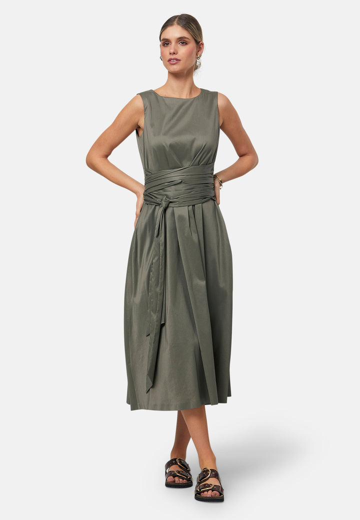 Introducing Avril, a sleeveless dress showcasing a tie waist and flattering empire line silhouette that gracefully skims the body, culminating in a chic mid-calf hemline. Perfect for holiday getaways, summer soirees and wedding events.