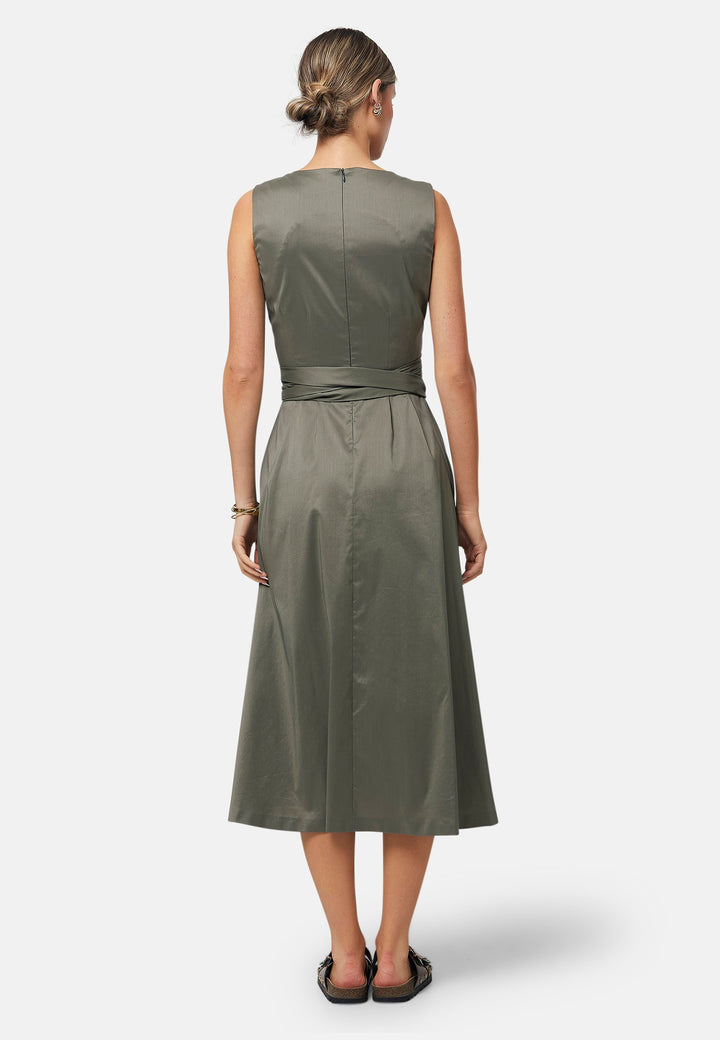 Introducing Avril, a sleeveless dress showcasing a tie waist and flattering empire line silhouette that gracefully skims the body, culminating in a chic mid-calf hemline. Perfect for holiday getaways, summer soirees and wedding events.