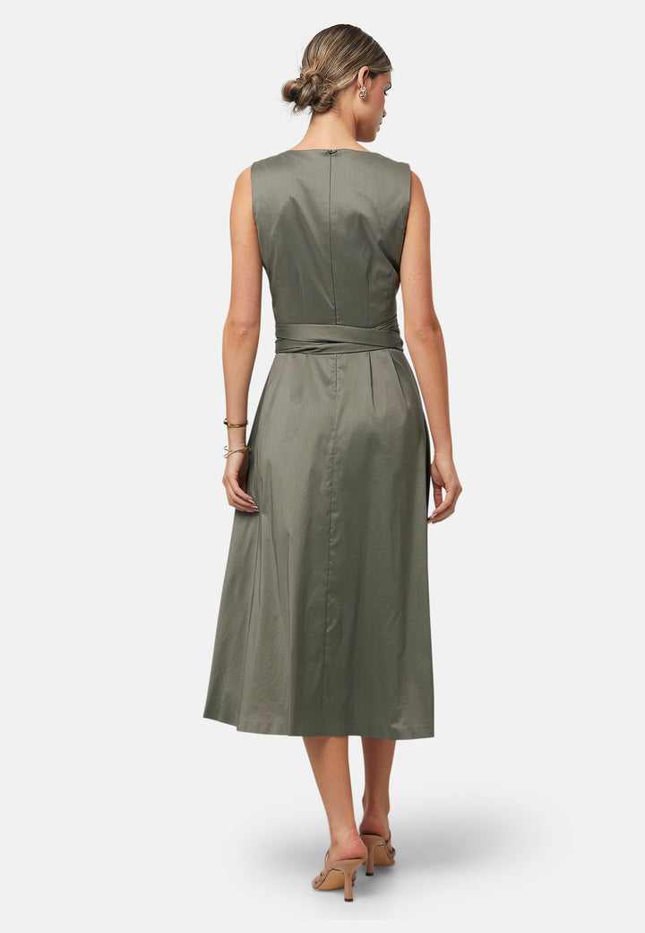 Introducing Avril, a sleeveless dress showcasing a tie waist and flattering empire line silhouette that gracefully skims the body, culminating in a chic mid-calf hemline. Perfect for holiday getaways, summer soirees and wedding events.