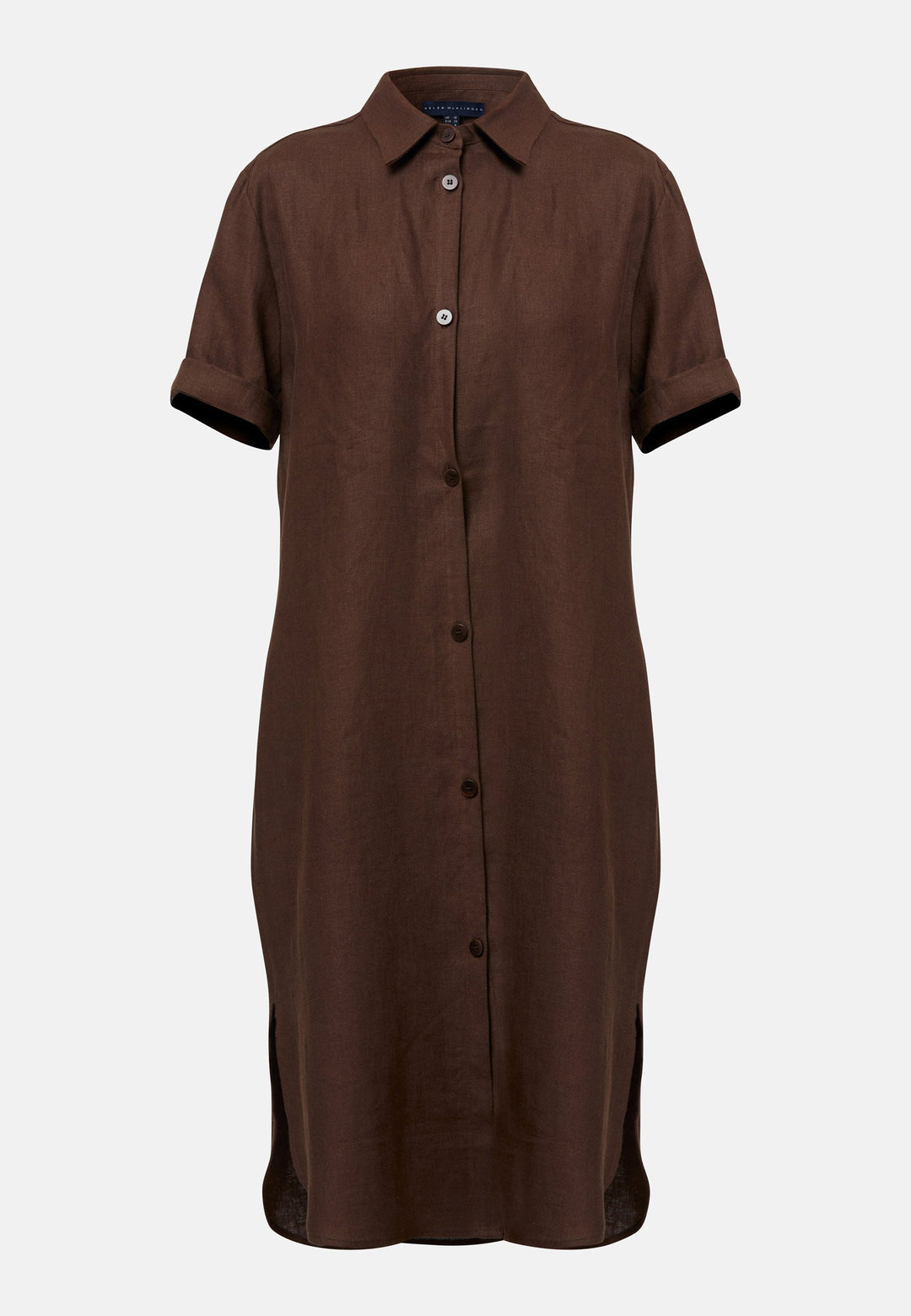 Bella, a relaxed brown shirt dress, offers effortless style with its button-down front, short T-shirt length sleeves, and curved hem. Crafted from breathable Baird McNuit Irish linen fabric, it’s perfect for warm-weather days. It combines comfort and versatility, making it a great choice for casual outings or laid-back weekends.