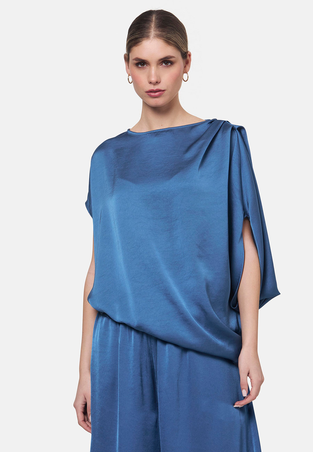 Woman wearing silk-touch satin in storm blue blouse