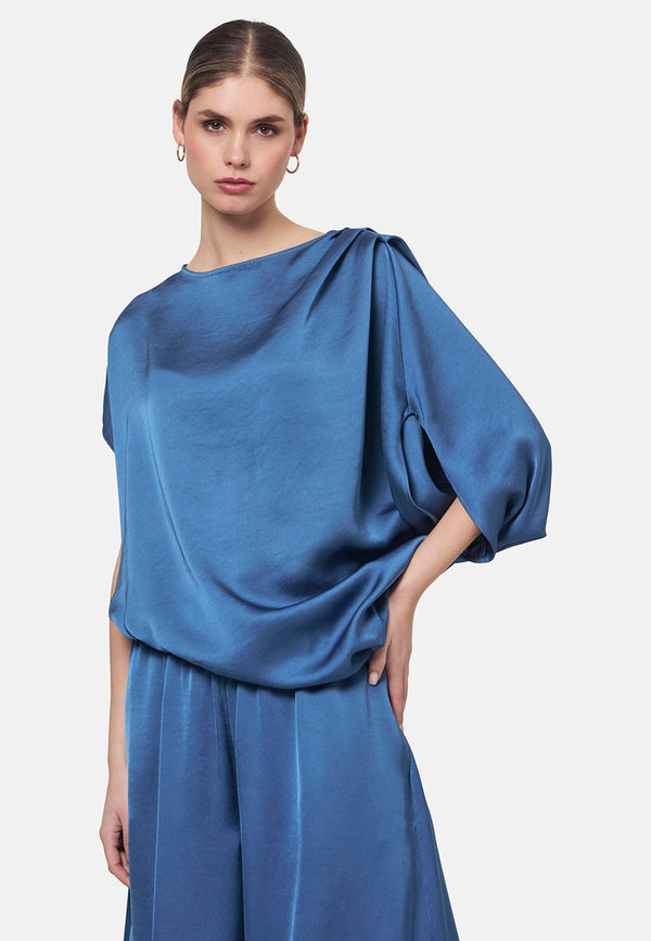Woman wearing silk-touch satin in storm blue blouse