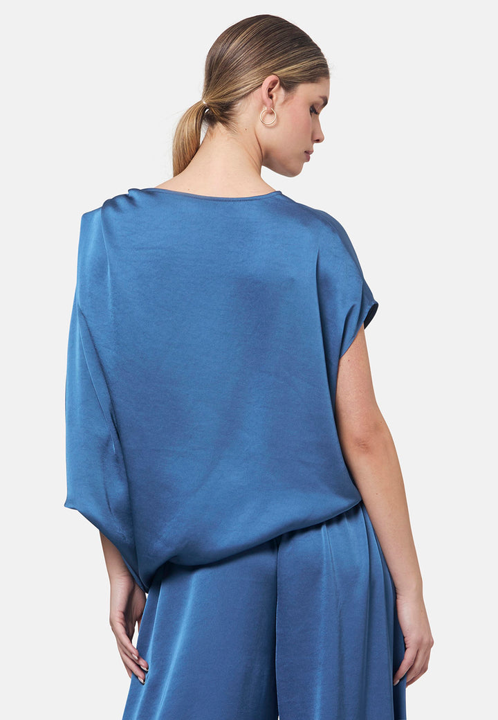 Woman wearing silk-touch satin in storm blue blouse