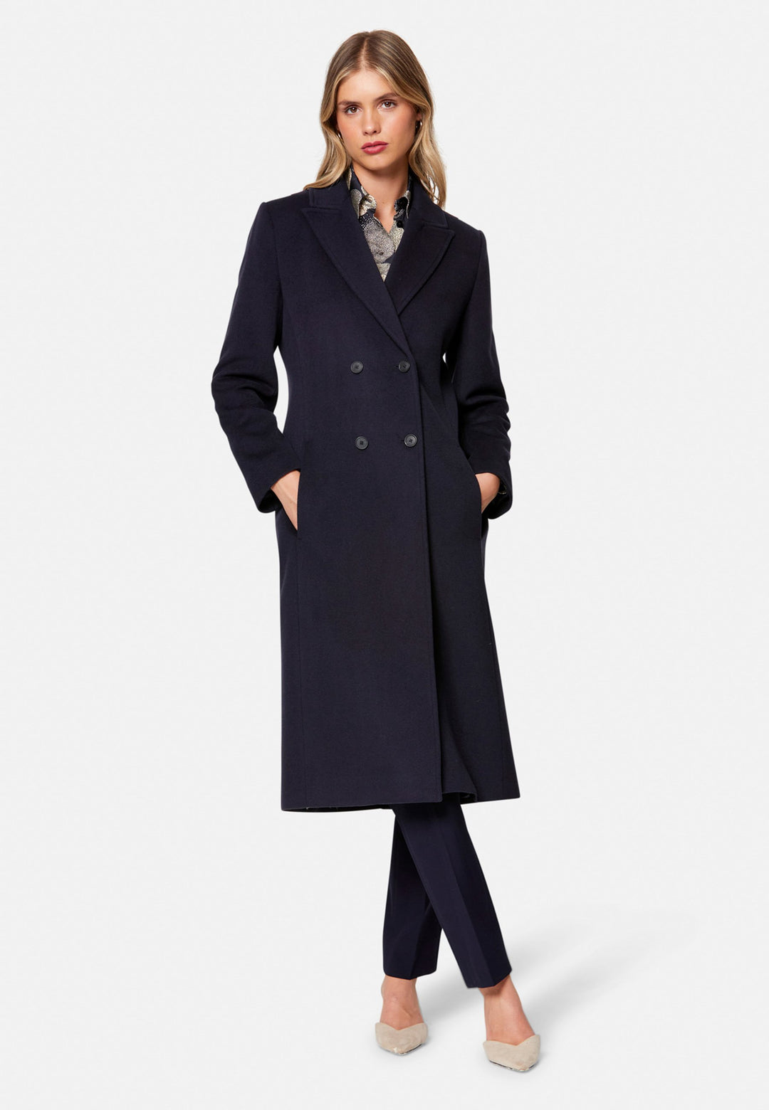 woman wearing double breast cashmere coat in navy