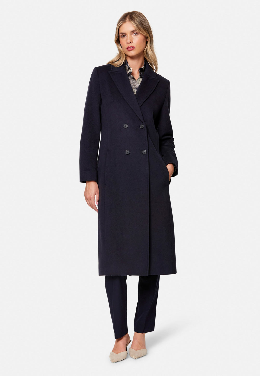 woman wearing double breast cashmere coat in navy