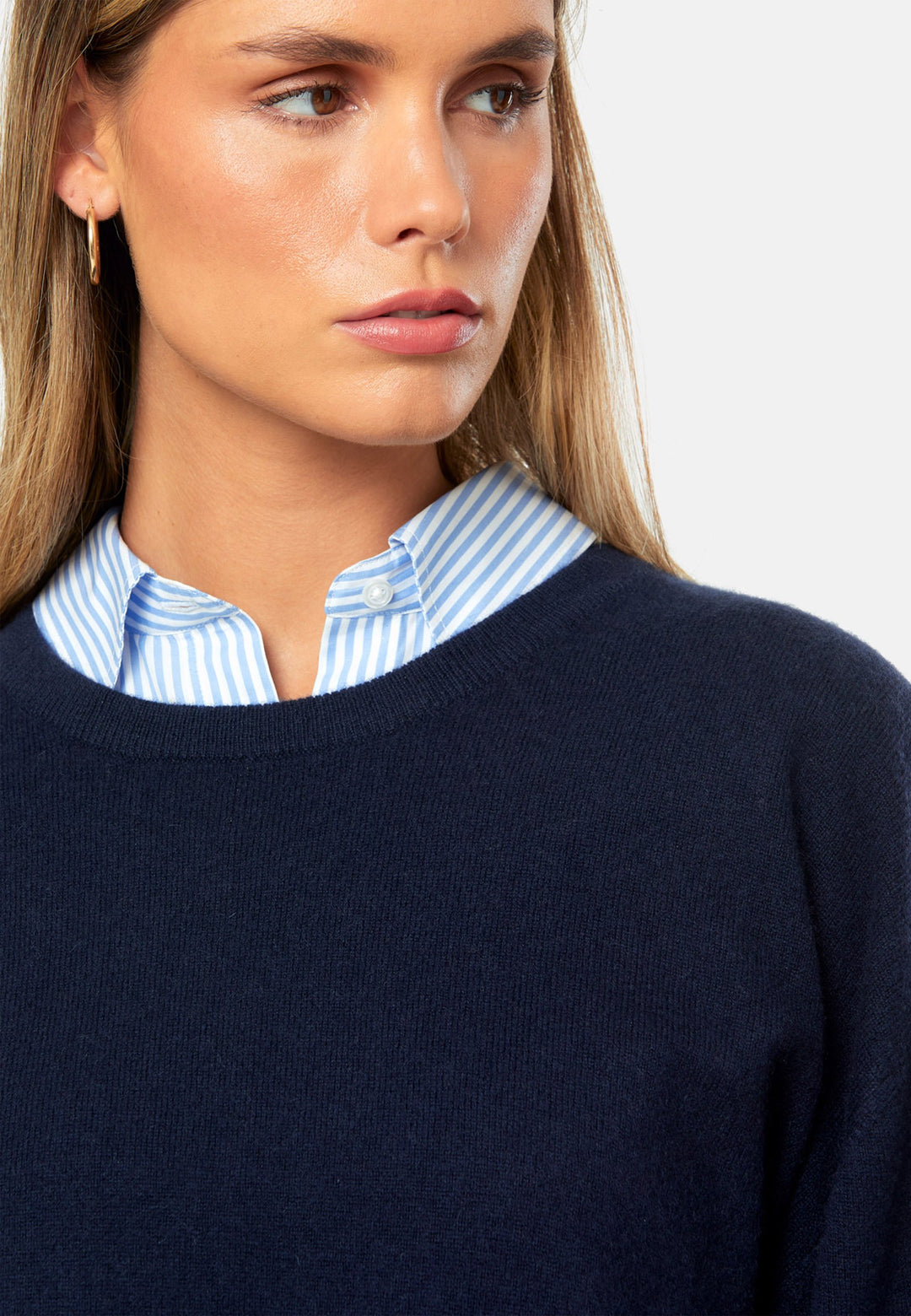 Spun from pure cashmere with a cloud-soft, feather-light handle, it features a neat crew neckline, subtly dropped shoulders and an easy, hip-skimming fit finished with fine rib trims. Effortless on its own with denim, smart layered over a shirt and suiting, and polished with the matching scarf.