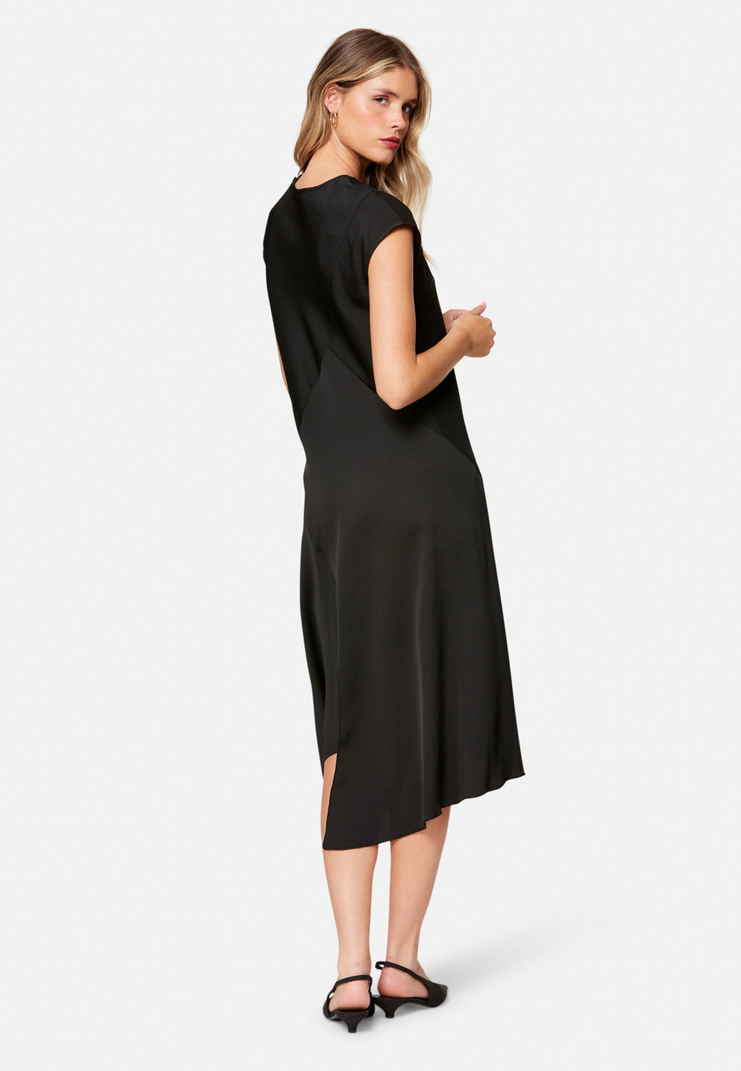 woman wearing black midi assymetric dress
