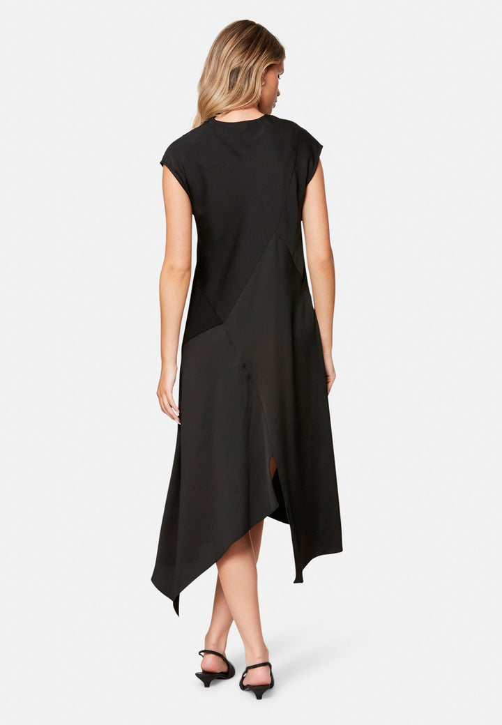 woman wearing black midi assymetric dress