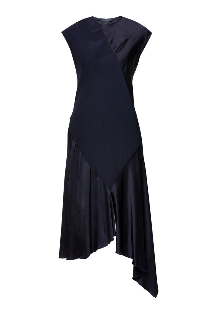 Carmin, the modern occasion dress with quiet drama. Cut from fluid, silk-touch satin in deep navy, it skims rather than clings, with a jewel neckline. Bias-cut panels and an asymmetric handkerchief hem add interest, while cap sleeves offer extra coverage. Style it with barely-there heels for evening, or a sharp blazer for city events.