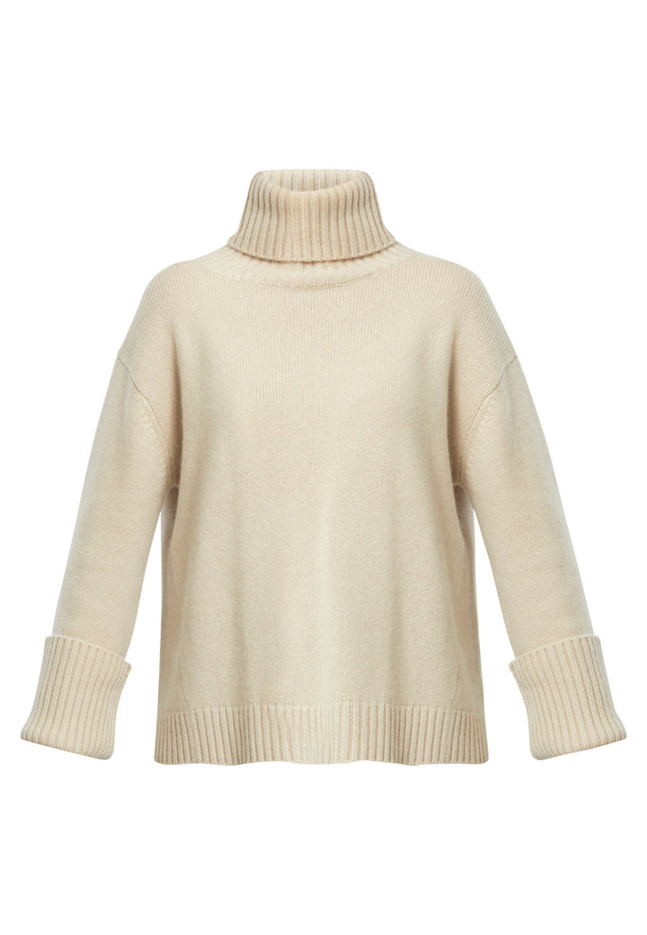 A modern take on the classic roll-neck, knitted in pure cashmere with a cloud-soft handle. Designed with a generous funnel neckline that can be folded or worn slouched, it features dropped shoulders and wide turn-back cuffs. The boxy, hip-skimming silhouette is finished with a deep rib hem for clean structure. Effortless with denim off-duty, refined with tailored trousers, and perfect layered under a long coat.