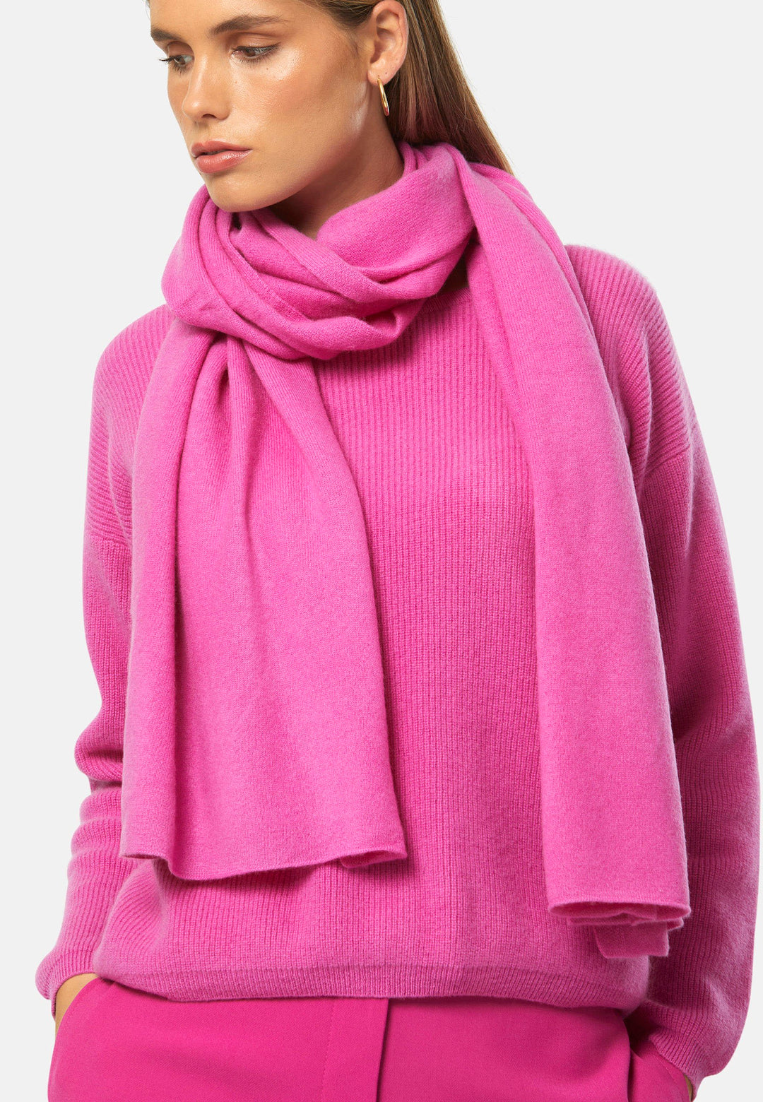 Knitted in pure cashmere with a soft handle, this generously cut wrap drapes fluidly. Loop, wrap or wear as a shoulder cover-up. It’s the easiest way to add colour to winter dressing. Pair with coordinating cashmere for a polished monotone look.