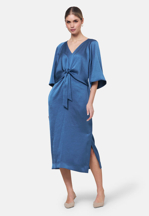 Woman wearing silk-touch satin in storm blue dress