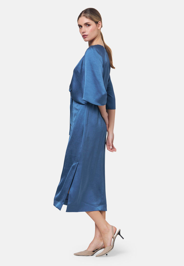 Woman wearing silk-touch satin in storm blue dress