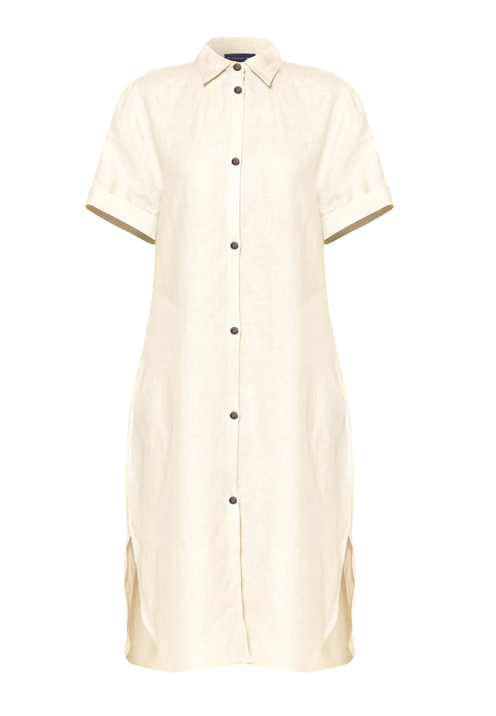 Bella, a relaxed Ecru shirt dress, offers effortless style with its button-down front, short T-shirt length sleeves, and curved hem. Crafted from breathable Baird McNuit Irish linen fabric, it’s perfect for warm-weather days. It combines comfort and versatility, making it a great choice for casual outings or laid-back weekends.