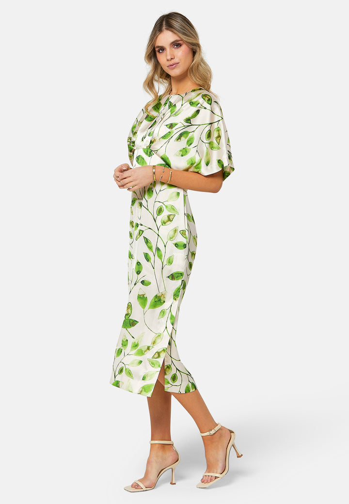 A captivating piece that seamlessly blends nature-inspired charm with sophisticated elegance. Featuring a delicate leafy print against a neutral backdrop, this dress captures the essence of serene beauty. Crafted from draped satin, it offers a luxurious feel with a graceful flow that complements its design. 