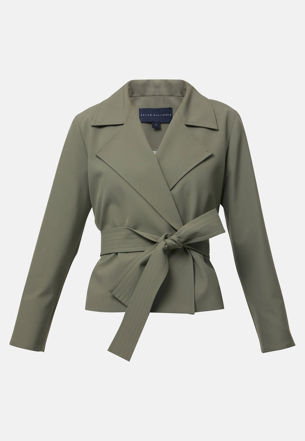 The epitome of summer sophistication. Minimalist styling accentuated by a classic notched lapel and a self-tie belt for a cinched waist, offering a flattering silhouette. The relaxed yet tailored fit makes it a versatile choice, perfect for both professional and smart-casual outfits. Pair it with a simple tee and the coordinating Lyra pant, finished with trainers for a chic and contemporary ensemble.