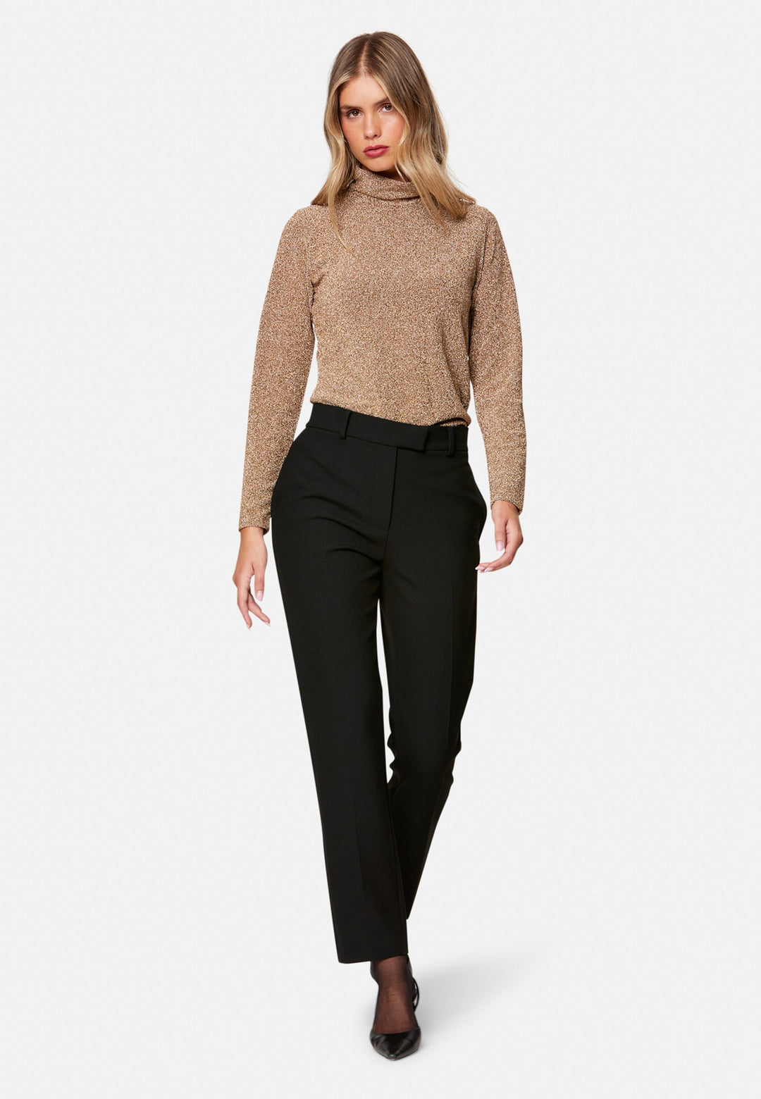 Cut from our signature tricotine with a hint of stretch, they sit neatly at the waist with a clean waistband, belt loops and concealed fastening. Pressed creases sharpen the narrow leg to an ankle-skimming finish, while side pockets keep them practical. Pair with the coordinating silk shirt for polish, or a crisp white tee for ease.