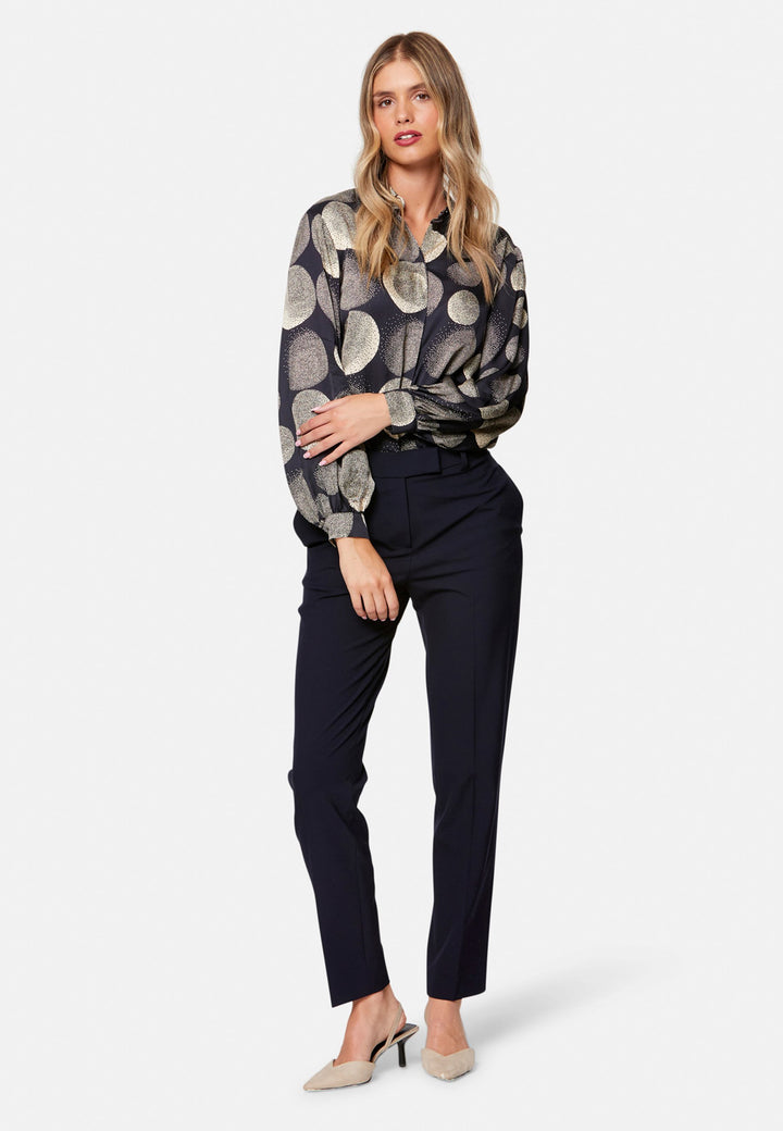 Georgiana, the tailored slim trouser. Cut in worsted navy bi-stretch suiting, it sits on the natural waist with a gently tapered leg falling to a neat ankle length. Finished with pressed creases, belt loops, side seam pockets and back welt pockets. Wear with the Darcie blazer for the coordinating suit, and style with the Anastasia pussy-bow blouse.