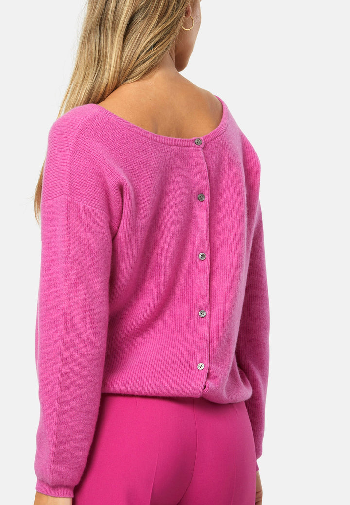 A versatile, reversible cardigan you can wear buttoned at the front or back, or pair with the matching Marlena top. Spun from pure cashmere with a plush, cloud-soft handle, it features a neat crew neckline, dropped shoulders and an easy, hip-skimming fit finished with fine rib trims.