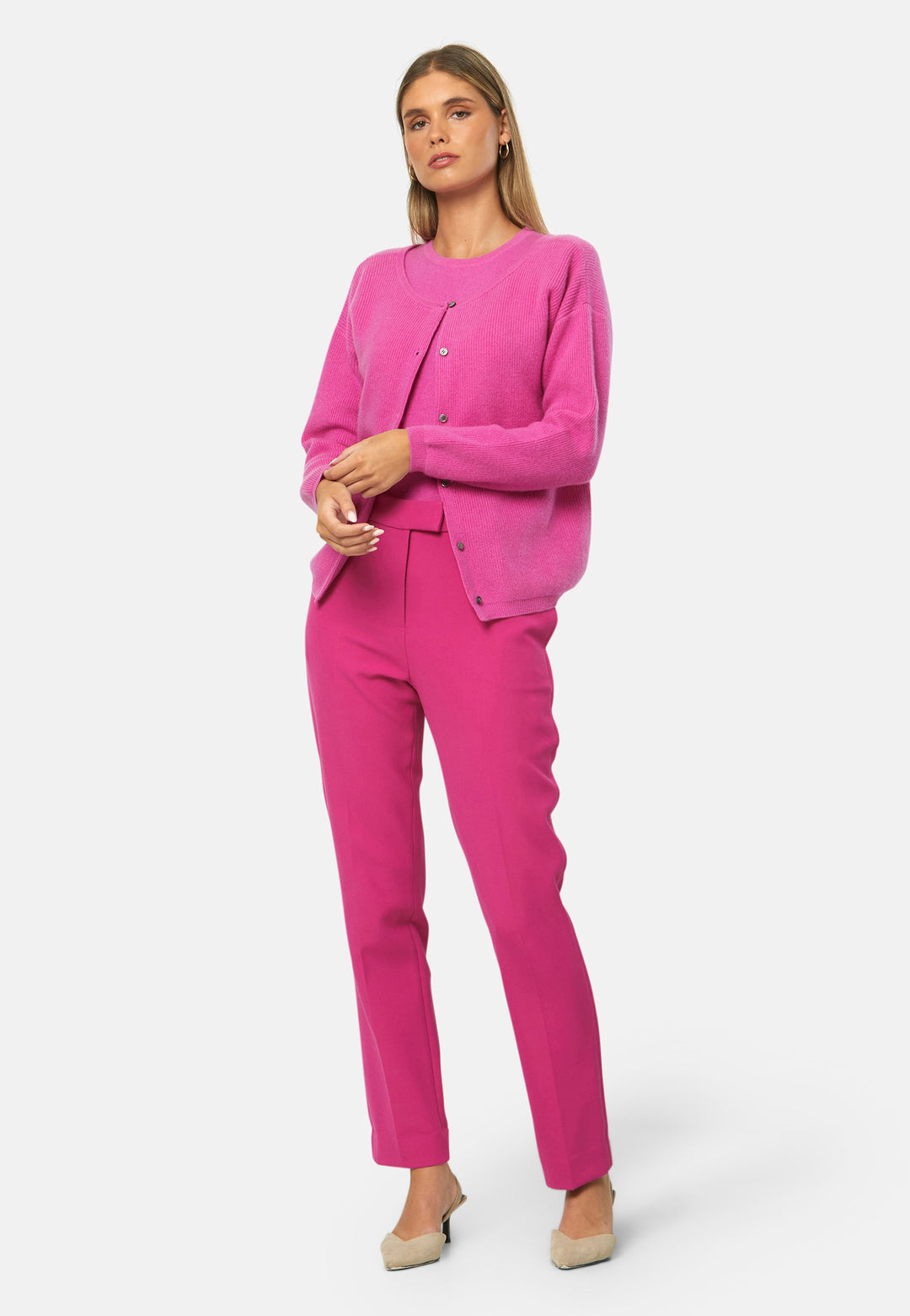 A versatile, reversible cardigan you can wear buttoned at the front or back, or pair with the matching Marlena top. Spun from pure cashmere with a plush, cloud-soft handle, it features a neat crew neckline, dropped shoulders and an easy, hip-skimming fit finished with fine rib trims.