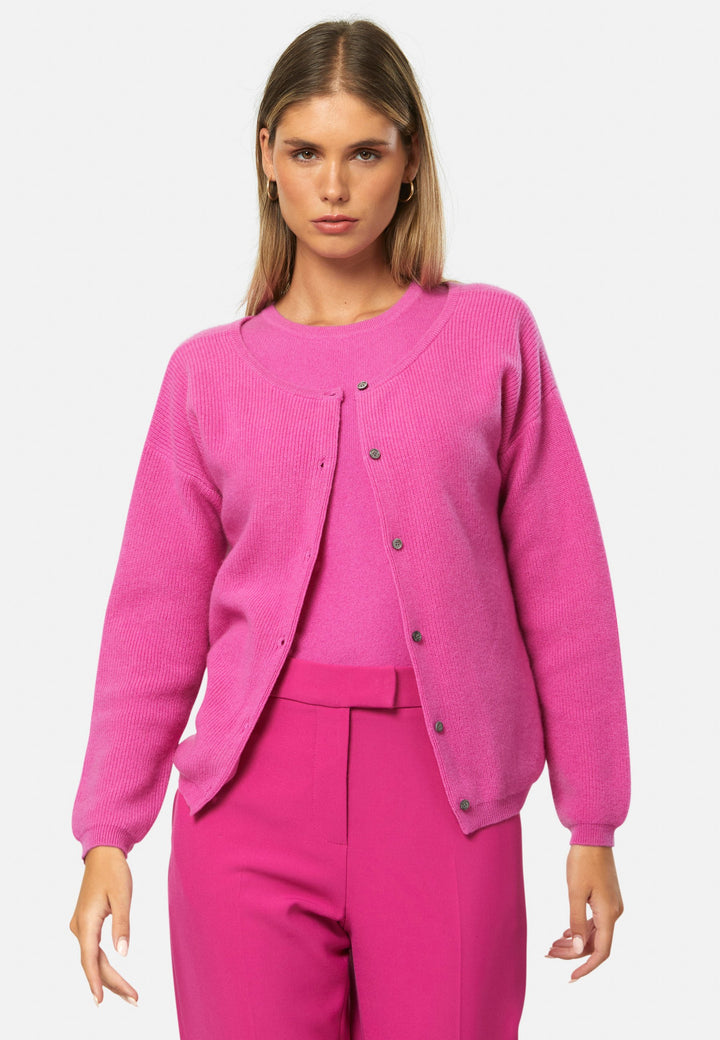 A versatile, reversible cardigan you can wear buttoned at the front or back, or pair with the matching Marlena top. Spun from pure cashmere with a plush, cloud-soft handle, it features a neat crew neckline, dropped shoulders and an easy, hip-skimming fit finished with fine rib trims.