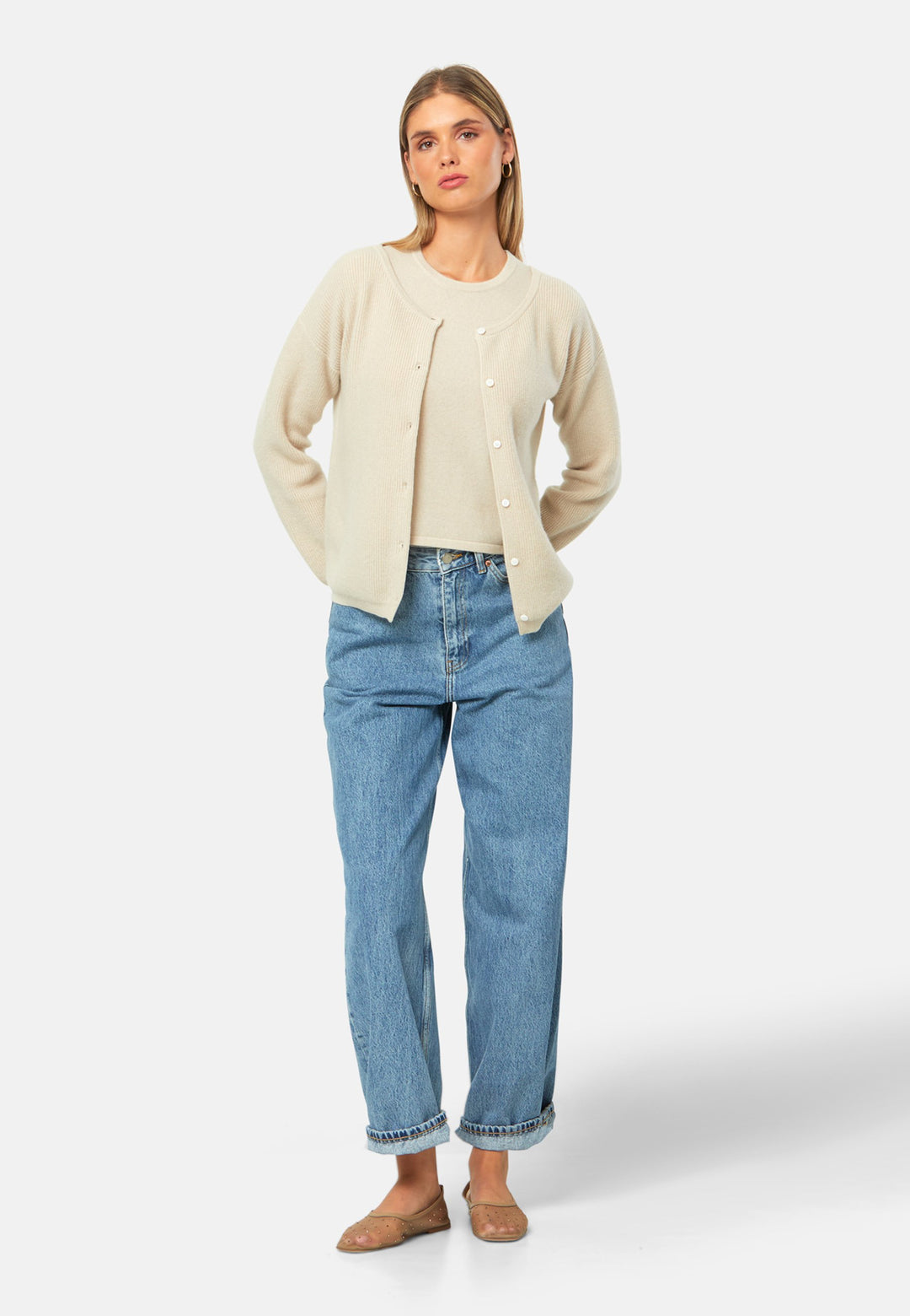 A versatile, reversible cardigan you can wear buttoned at the front or back, or pair with the matching Marlena top. Spun from pure cashmere with a plush, cloud-soft handle, it features a neat crew neckline, dropped shoulders and an easy, hip-skimming fit finished with fine rib trims.