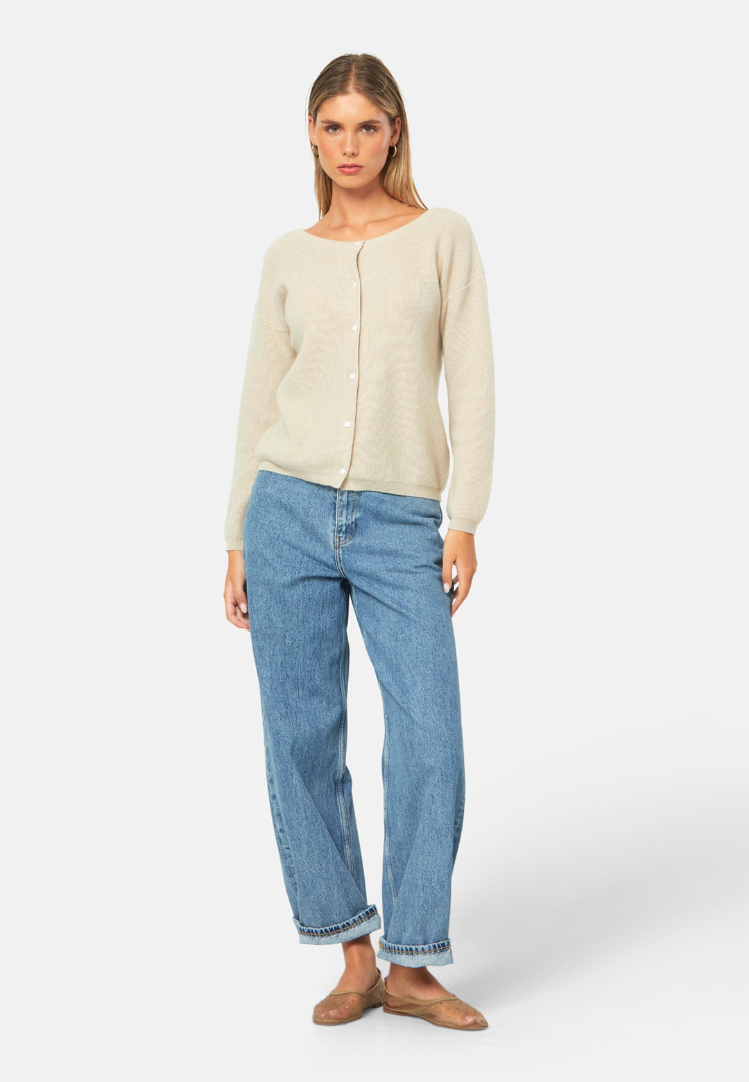 A versatile, reversible cardigan you can wear buttoned at the front or back, or pair with the matching Marlena top. Spun from pure cashmere with a plush, cloud-soft handle, it features a neat crew neckline, dropped shoulders and an easy, hip-skimming fit finished with fine rib trims.