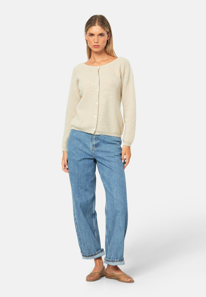 A versatile, reversible cardigan you can wear buttoned at the front or back, or pair with the matching Marlena top. Spun from pure cashmere with a plush, cloud-soft handle, it features a neat crew neckline, dropped shoulders and an easy, hip-skimming fit finished with fine rib trims.