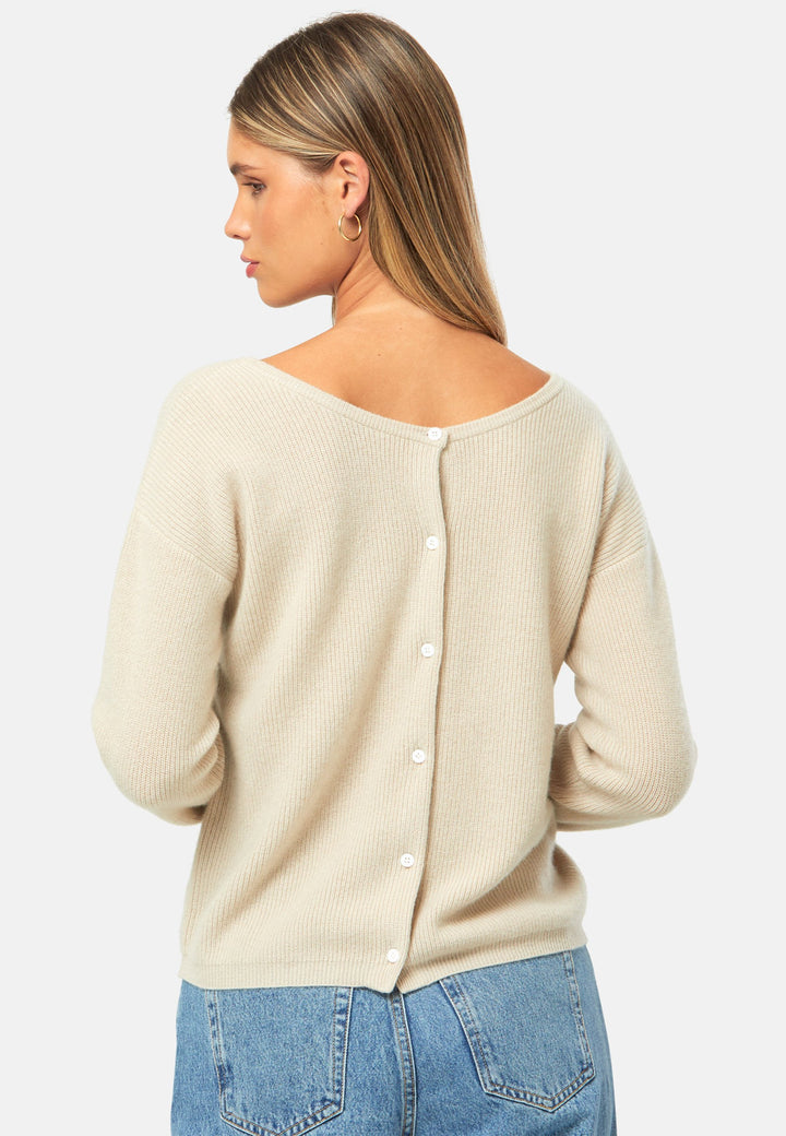 A versatile, reversible cardigan you can wear buttoned at the front or back, or pair with the matching Marlena top. Spun from pure cashmere with a plush, cloud-soft handle, it features a neat crew neckline, dropped shoulders and an easy, hip-skimming fit finished with fine rib trims.