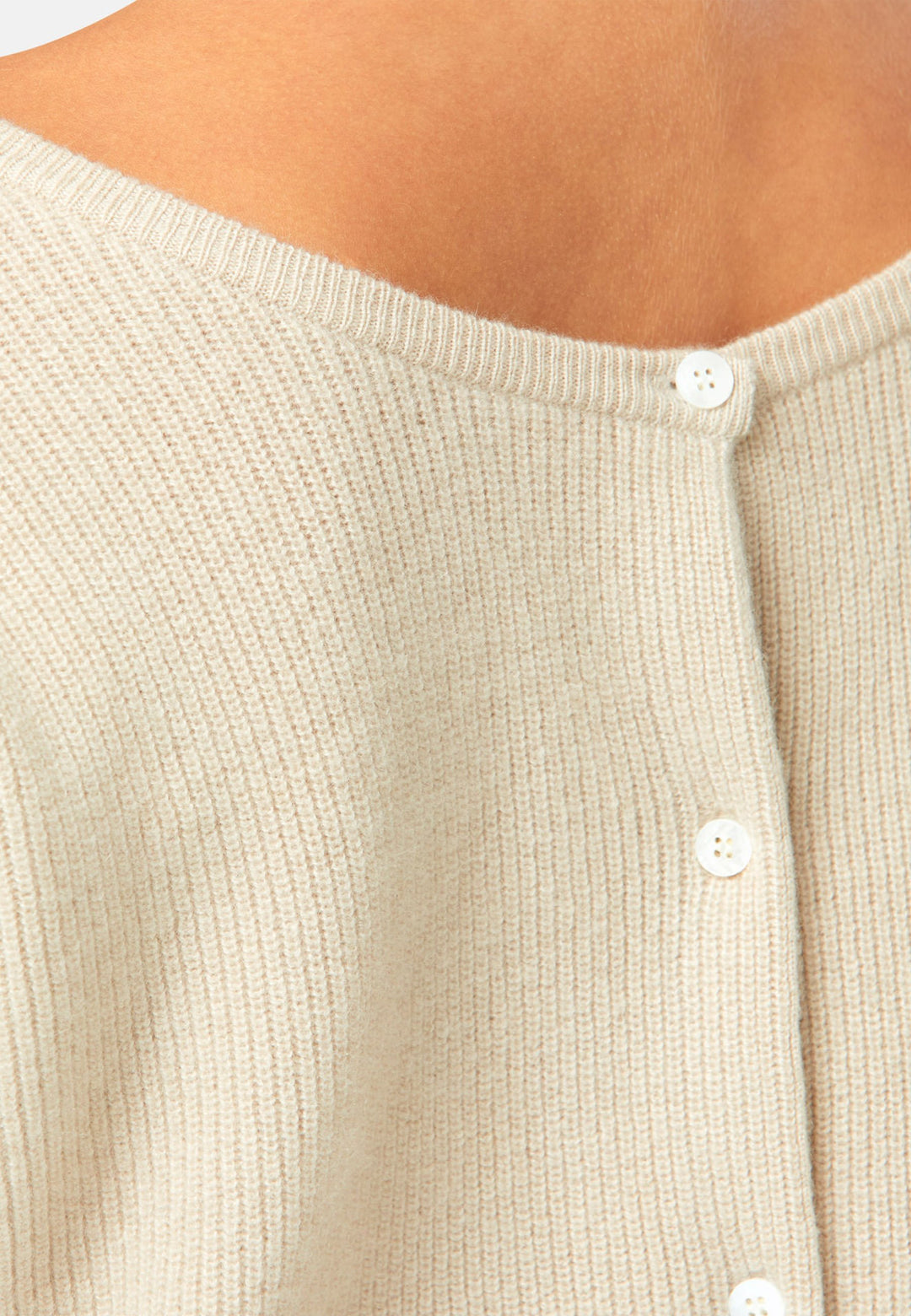 A versatile, reversible cardigan you can wear buttoned at the front or back, or pair with the matching Marlena top. Spun from pure cashmere with a plush, cloud-soft handle, it features a neat crew neckline, dropped shoulders and an easy, hip-skimming fit finished with fine rib trims.