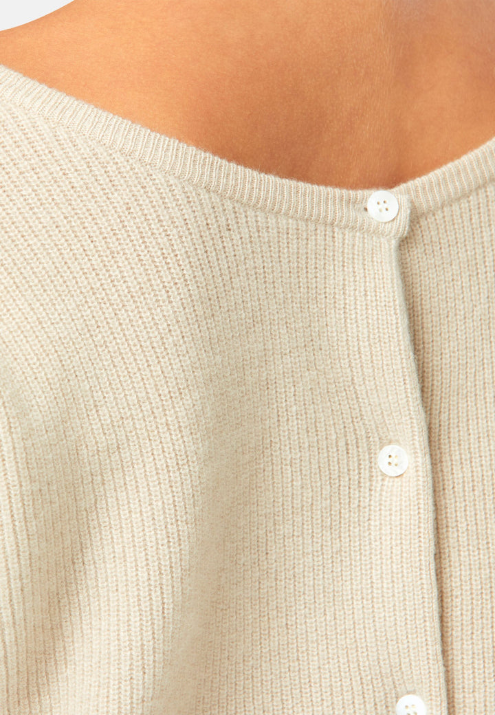 A versatile, reversible cardigan you can wear buttoned at the front or back, or pair with the matching Marlena top. Spun from pure cashmere with a plush, cloud-soft handle, it features a neat crew neckline, dropped shoulders and an easy, hip-skimming fit finished with fine rib trims.